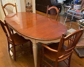 Thomasville table has 2 leaves /4 chairs