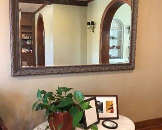 Large mirror marble top coffee table house plant picture frames