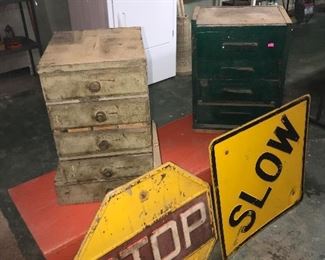 Yellow Stop sign state route sign 
Yellow slow sign 
Primitive orange bench 
Primitive drawers
