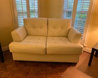 White leather loveseat