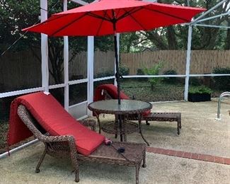 Outdoor table chairs and umbrella