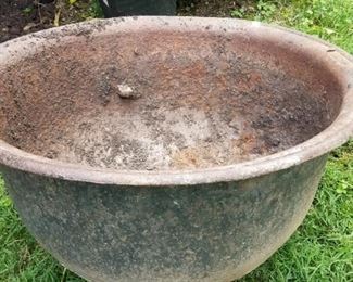 Much outdoor decor. Cast iron pot