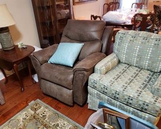 Leather rocker recliner and one of 2 matching rocker chairs