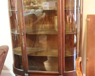 beautiful antique curio cabinet with curved glass