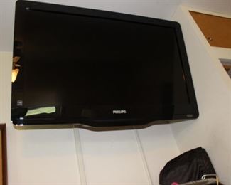 Phillips TV and Stand in closet