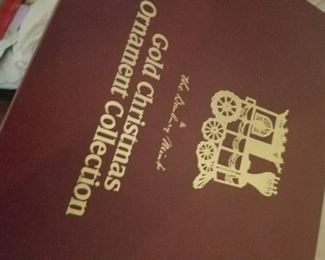 6 boxes of Gold Christmas ornaments