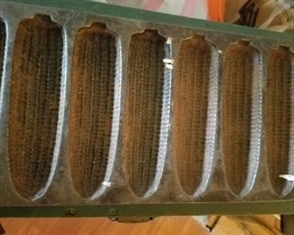 2 corn cast iron pans