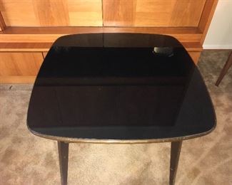 Mid Century Modern table, black acrylic top.