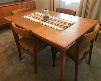 $2,400
Vintage Danish Modern Dyrlund table and 6 chairs (hidden leaves).