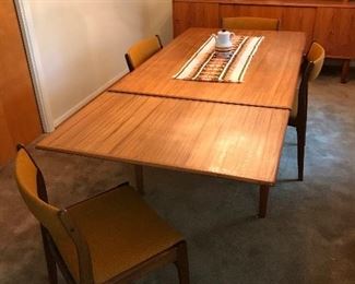 $2,400
Vintage Danish Modern Dyrlund table and 6 chairs (hidden leaves).
