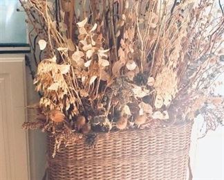 Vintage large basket with dried floral arrangement