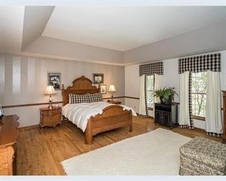 Master bedroom done in shades of black and white with toile and firefly accents