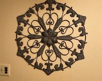 Many metal pieces of wall decor and general accessories