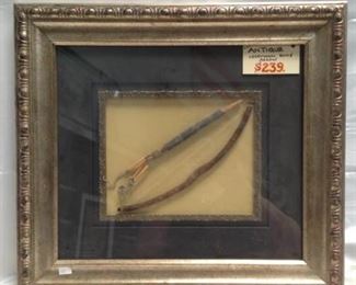 https://connect.invaluable.com/randr/auction-lot/antique-ceremonial-bone-arrow-in-shadow-box_50D415A9A9