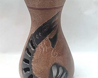 https://connect.invaluable.com/randr/auction-lot/southwest-stoneware-candle-holder-vase_D1B4221A46