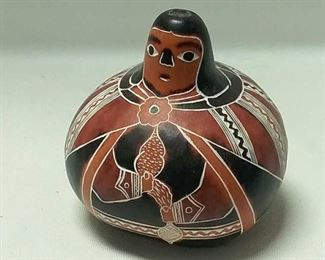 https://connect.invaluable.com/randr/auction-lot/made-in-peru-painted-gourd_3564AD8A69