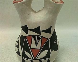 https://connect.invaluable.com/randr/auction-lot/acoma-pottery-wedding-vase-signed-r-m_B9B423489C