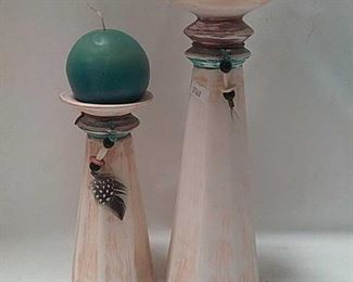 https://connect.invaluable.com/randr/auction-lot/signed-pottery-candle-sticks-southwest-dcor_12449BF857