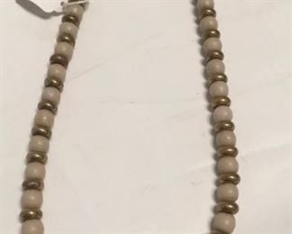 https://connect.invaluable.com/randr/auction-lot/c1700s-white-padre-beads-trade-beads-brass-beads_AE34E3A971
