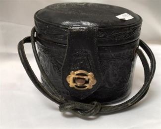 https://connect.invaluable.com/randr/auction-lot/antique-black-tooled-leather-cosmetic-case_CED4C8E82B