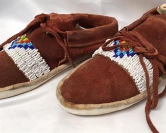 https://connect.invaluable.com/randr/auction-lot/native-american-indian-micro-beaded-moccasins_CB541D3972