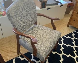 Antique chair that has been reupholstered 
