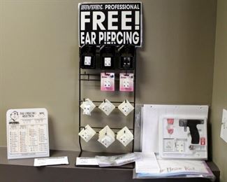 Ear Piercing Equipment Including Studex Universal Ear Piercing System And Accessories, Includes Ear Studs New In Package Qty 37 And Display Stands, Qty 2