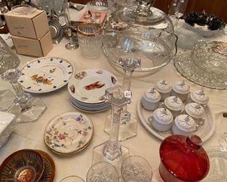 Many china plates, crystal and glassware items.