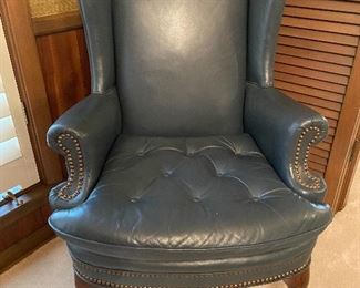 Leather wing back chair.