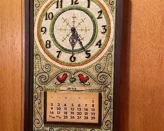 Needlepoint calendar clock.