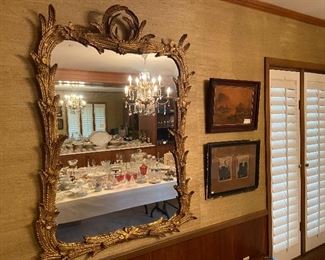 Huge gilded gold framed mirror.