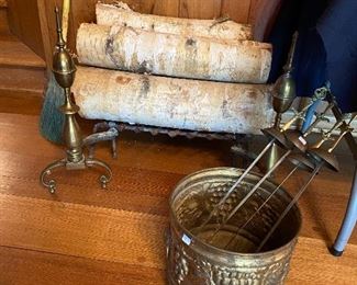 We get to sell the andirons, wood rack and tools.  OH! and the wood!