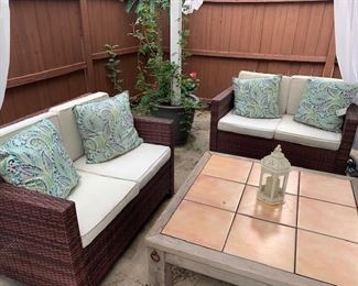 Wicker Patio Set $95 per loveseat (1 available) Pillows sold