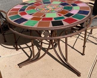 Iron Tile Top Patio Table w/ 4 Chairs Table: 32in H x 42in Diameter Chairs: 41x25x23in