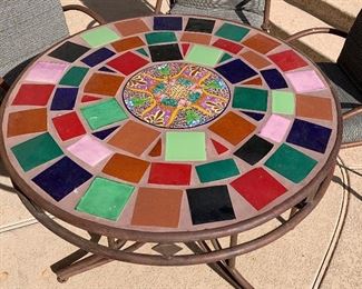 Iron Tile Top Patio Table w/ 4 Chairs Table: 32in H x 42in Diameter Chairs: 41x25x23in