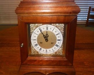 TE-22 - Clock runs but needs adjusting.  Missing the Back. Key is included - $30