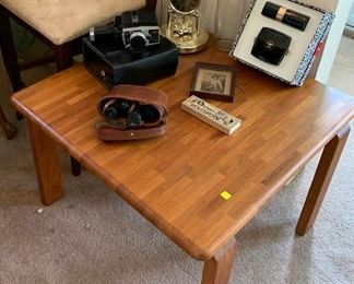 Vintage Teak coffee table very solid unique piece. You could stand on this all day!
