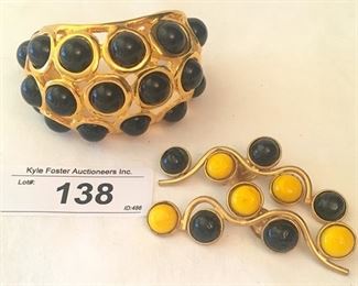 Dominique Aurientis clip on earrings and Kenneth Lane bangle 
