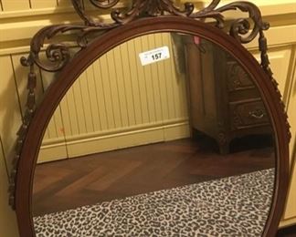 Antique empire style carved oval wall mirror