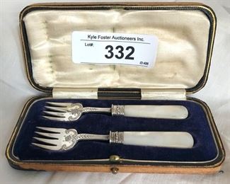 Set of vintage A & D silver plate canapé forks with pearlier handles