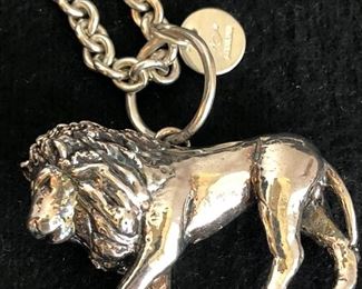 JC sterling chain necklace with a lion charm
