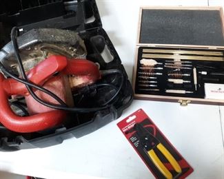Circular Skilsaw, gun cleaning kit, wire stripper
