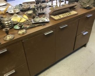 Large metal desk with vintage sterling items