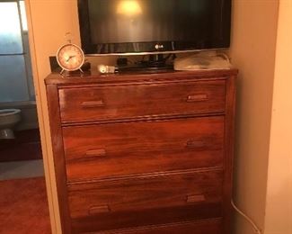 Flat screen TV and very nice smaller sized dresser