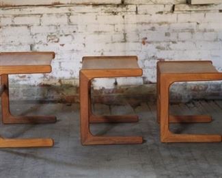 Three nesting teak tables