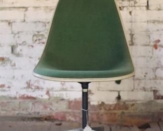 Eeames chair for Herman Miller with original green fabric upholstery and label