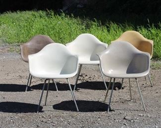 Five Eames for Herman Miller armchairs on H bases.