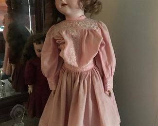 This stylish young lady is a Simon Halbig original with replaced wig and vintage, but not original, dress.  