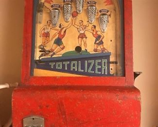 AVAILABLE at the AUGUST 22/23 Sale!  With original red paint on its wooden case, the “Totalizer” allows players to enjoy the game of Basketball.