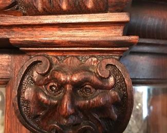 The North Face motif on top the pillar adorning the china cabinet.